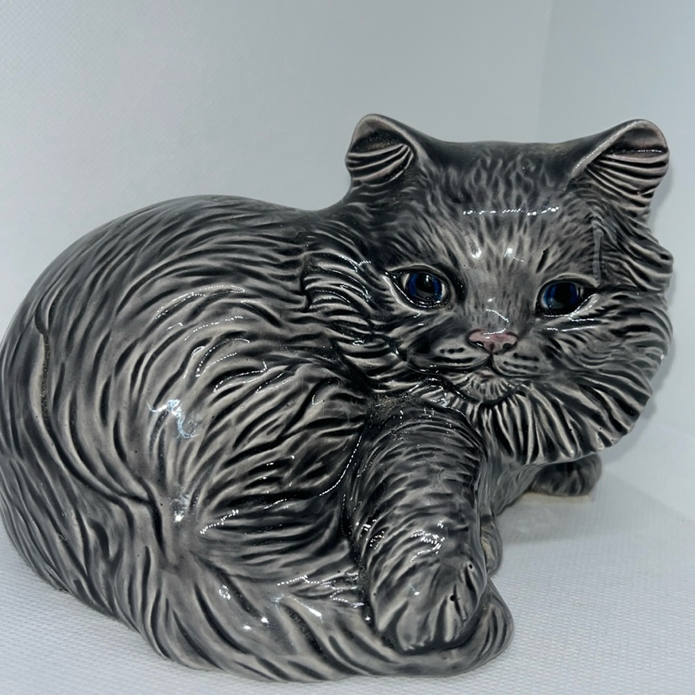 Ceramic cat with blue eyes